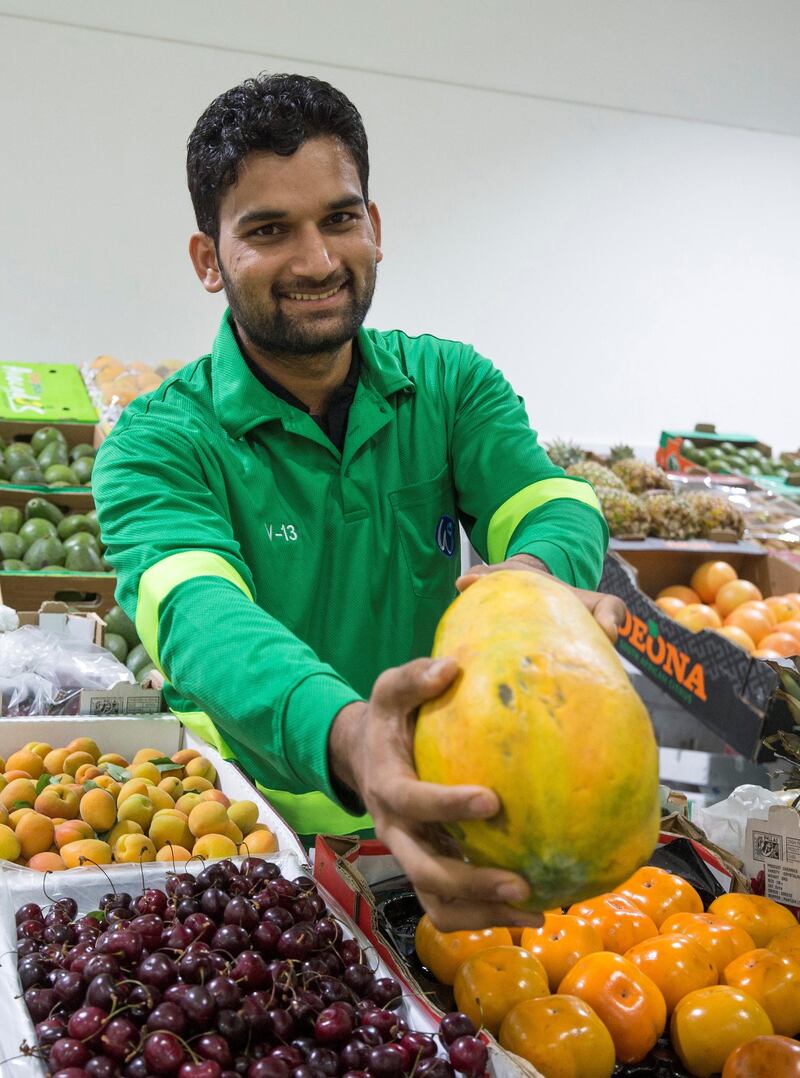 DUBAI, UNITED ARAB EMIRATES -Muhammad Ahsan a vendor at the fruits and vegetables section at the Waterfront Market, Deira.  Leslie Pableo for The National