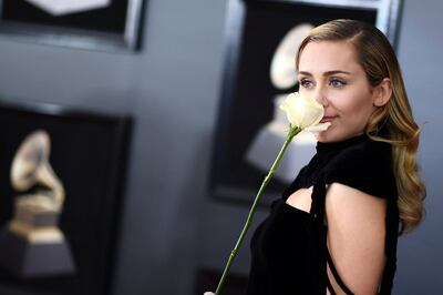 Miley Cyrus arrives for the 60th Grammy Awards on January 28, 2018, in New York.  / AFP PHOTO / Jewel SAMAD