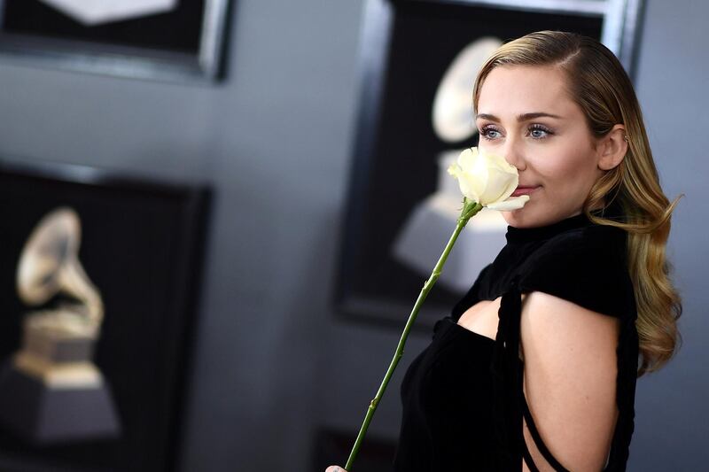 Miley Cyrus arrives for the 60th Grammy Awards on January 28, 2018, in New York.  / AFP PHOTO / Jewel SAMAD