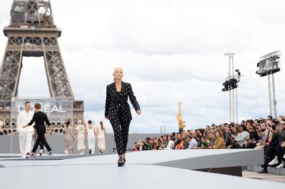 Dame Helen Mirren walks the runway during Le Defile L'Oreal Paris 2021 as part of Paris Fashion Week 2021. Getty Images