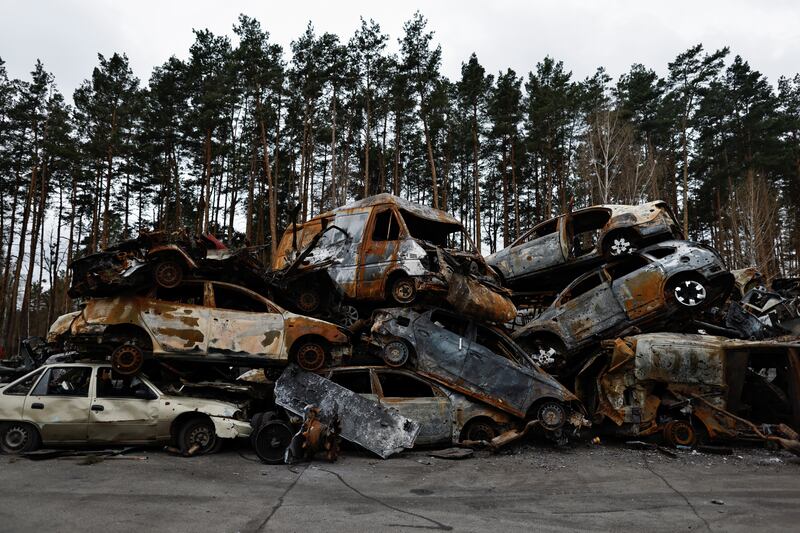 Cars destroyed amid Russia's attack on Ukraine in Irpin, Kyiv, after they were collected from different places. Reuters