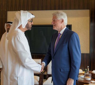 ABU DHABI, UNITED ARAB EMIRATES - February 22, 2018: HH Sheikh Mohamed bin Zayed Al Nahyan, Crown Prince of Abu Dhabi and Deputy Supreme Commander of the UAE Armed Forces (L), greets Bill Clinton, former President of the United States of America (R), at Al Shati Palace.
( Mohamed Al Hammadi  / Crown Prince Court - Abu Dhabi )
---