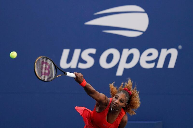 Serena Williams serves to Sloane Stephens during the third round of the US Open. AP Photo