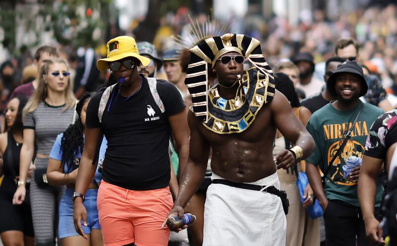 Carnival revellers attend the London festival. EPA