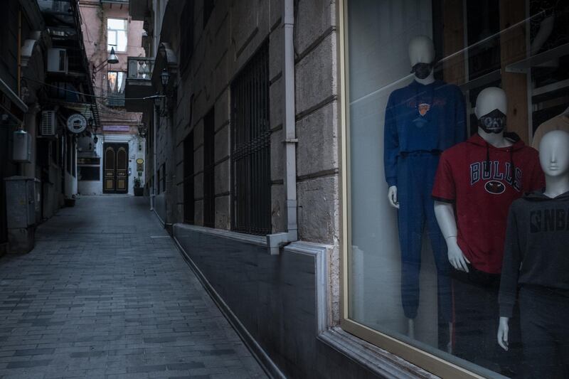 Mannequins are seen in a closed shop on an empty street during a three-week nationwide coronavirus lockdown in Istanbul, Turkey. Getty Images