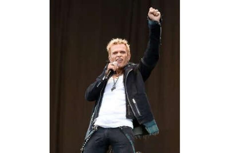 Billy Idol's performance on day three of Download was met with heavy rain.
