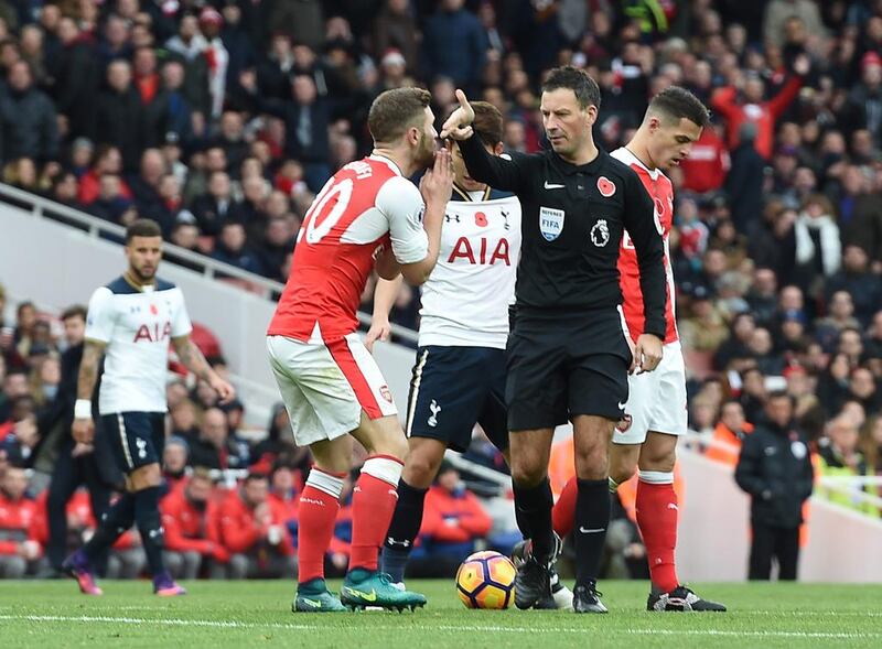 Referee Mark Clattenburg awards a penalty to Tottenham. Andy Rain / EPA
