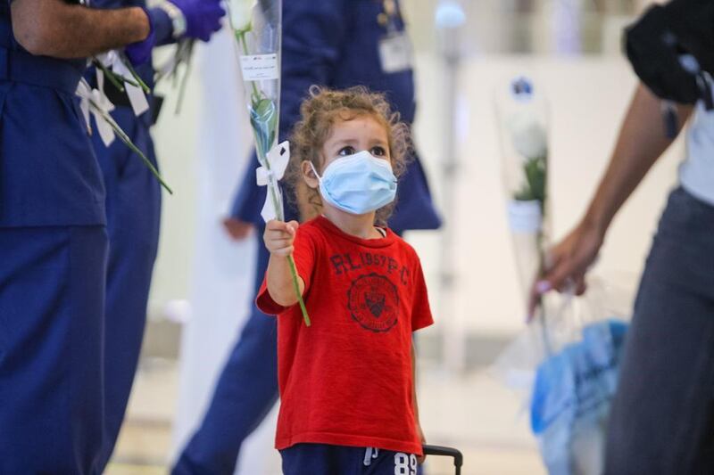 Passengers from Beirut were presented with flowers upon arrival at Dubai International Airport last night. Courtesy: Dubai Customs