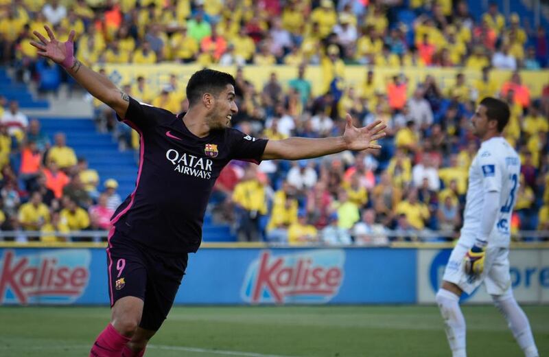 Barcelona’s Uruguayan forward Luis Suarez celebrates a goal against Las Palmas. Desiree Martin / AFP