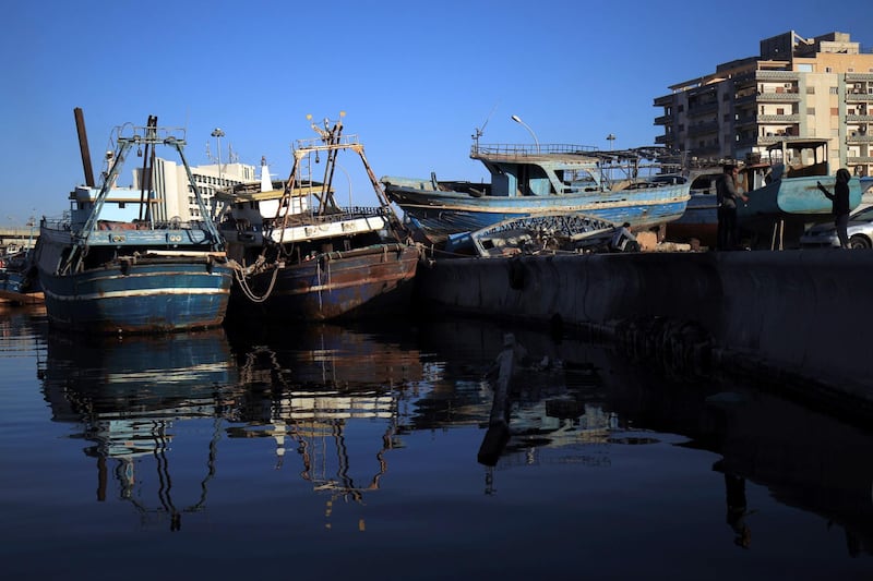 Libyan fishing boats are moored at the Libyan port of Benghazi, during Ramadan, on May 16, 2019.  AFP