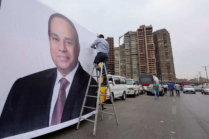 One of many banners depicting President Abdel Fattah El Sisi, who is expected to win December's election, is put up in Cairo. Reuters