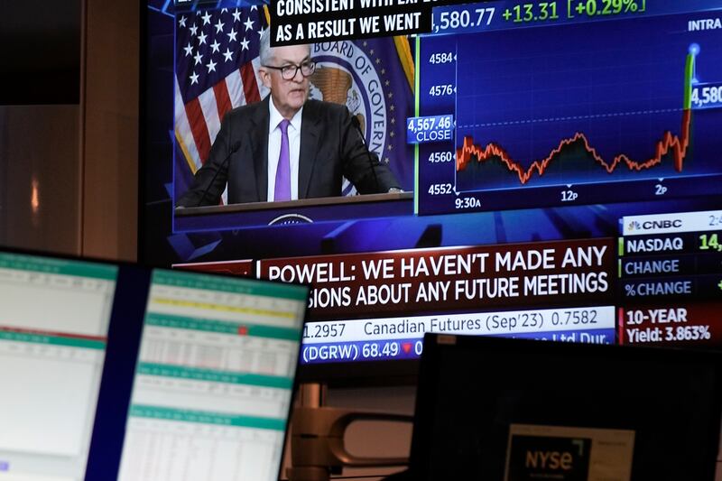 Federal Reserve chairman Jerome Powell's news conference is displayed at the New York Stock Exchange. AP