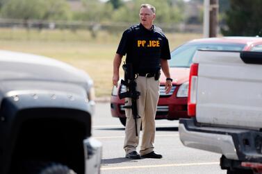 US police have not identified the white male who hijacked a post van before shooting at passers-by. AP