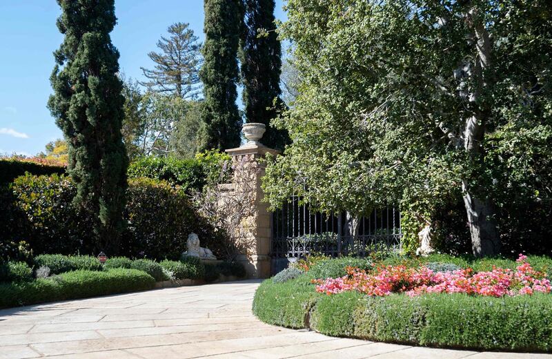 View of the gate of the Estate where Prince Harry and his wife US actress Meghan Markle have their house, in Montecito, California on March 6, 2021. Prince Harry and Meghan Markle headed to California and relocated in July, 2020 to Montecito, a small and affluent seaside city 100 miles (160 kilometers) up the coast, where a spokesperson said they had "settled into the quiet privacy of their community." The area is home to a handful of showbiz stars including Oprah Winfrey, Ellen DeGeneres and Rob Lowe. 
Meghan Markle said it feels "liberating" to be able to speak out about her life in the British royal family in an excerpt released March 5, 2021, of her hotly anticipated interview with US host Oprah Winfrey. 
 / AFP / VALERIE MACON
