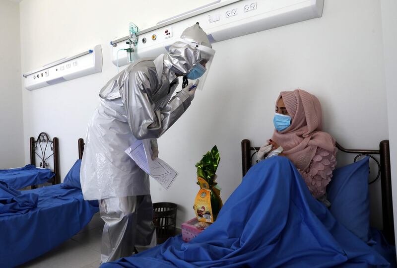 A Palestinian medical team member works in the Covid-19 section of Dura hospital in the West Bank city of Dura near Hebron. EPA