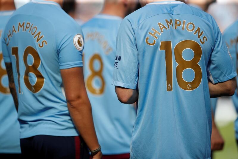 The shirts of Manchester City players and staff as they celebrate winning the premier league title. Carl Recine / Action Images via Reuters