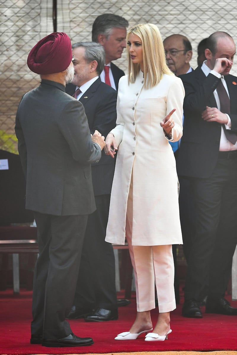 White House senior advisor Ivanka Trump in a classic white silk jacket by Mumbai-based, vegan and environmentalist designer Anita Dongre. AFP