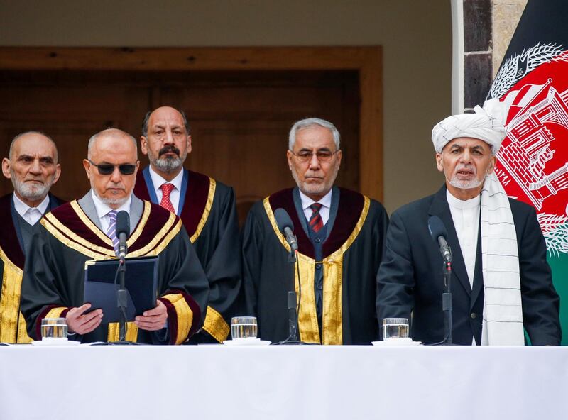 Afghanistan's President Ashraf Ghani takes an oath during his inauguration. Reuters