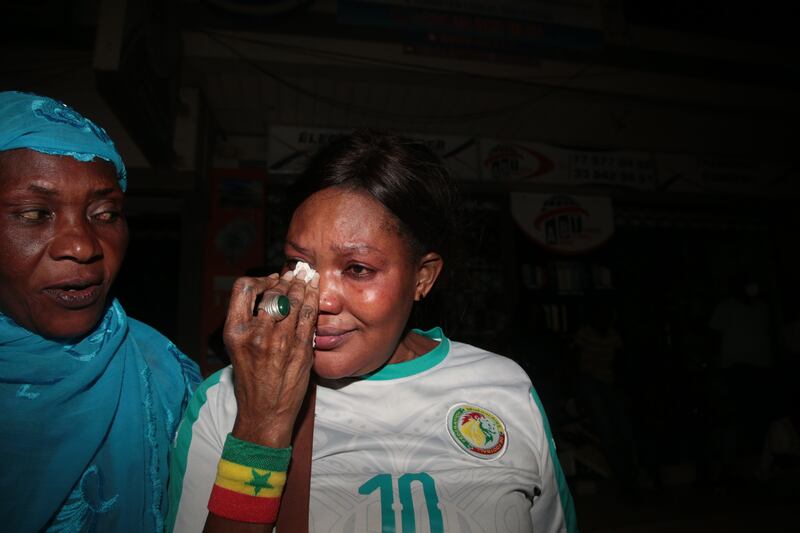 An emotional Senegalese football fan celebrates in Dakar, Senegal. EPA