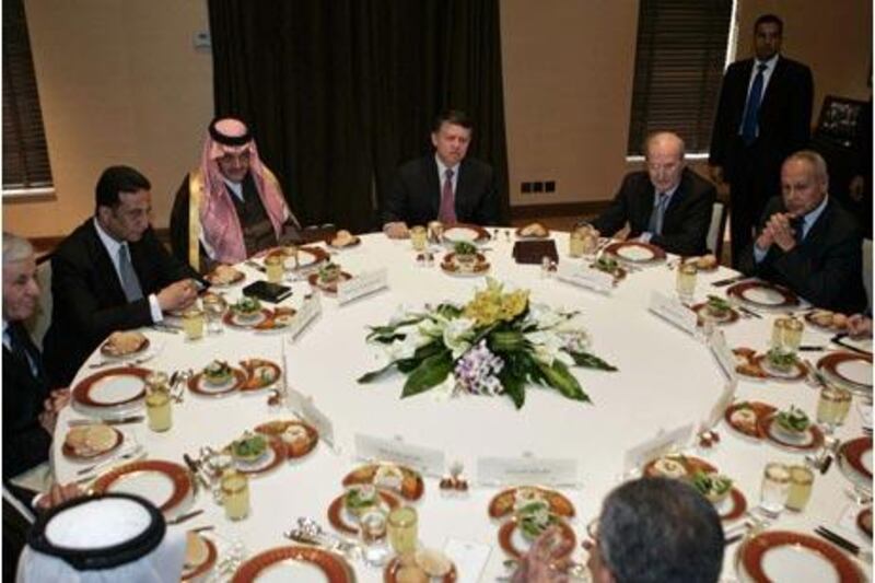 Jordan's King Abdullah, centre, meets with Arab foreign ministers at the Royal Palace in Amman.