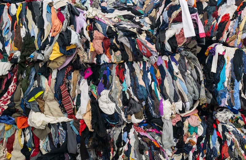 Millions of items of clothing end up in landfills annually. Getty Images / AFP