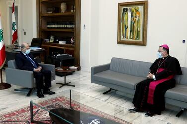 Lebanese President Michel Aoun receives the papal ambassador to Lebanon, Monsignor Joseph Spitry at the presidential palace in Baabda, near Beirut, on March 19, 2021. Courtesy Lebanese government