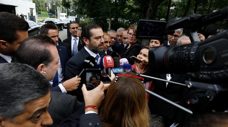 Lebanese premier-designate Saad Hariri speaks to the press in front of the Special Tribunal for Lebanon after the presentation of the closings arguments in the trial of four Hezbollah suspects accused of 2005 assassination of his father the late Lebanese prime minister on September 10, 2018, in The Hague. - The trial of four Hezbollah suspects in the assassination of Lebanese ex-prime minister Rafiq Hariri enters the final stretch on September 11 2018, with closing arguments in the long-running case. The Special Tribunal for Lebanon is unique in international law as it can try suspects in absentia, as well as for its ability to try accused perpetrators of an individual terrorist attack. (Photo by Bas CZERWINSKI / ANP / AFP) / Netherlands OUT