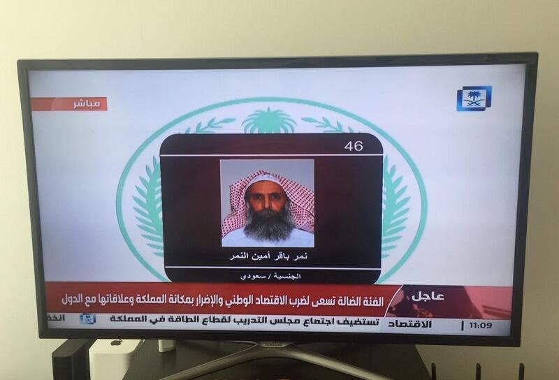 Saudi Arabia's state television channel shows an image of Sheikh Nimr Al Nimr on January 2, 2016. Jon Gambrell/AP Photo 