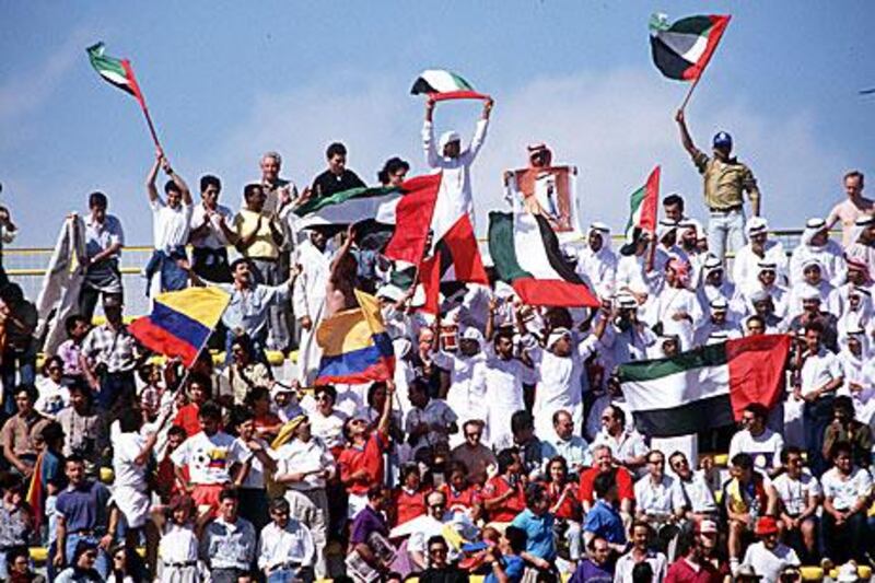 UAE fans mingle with supporters from Colombia during the match between the two nations in Bologna, Italy, on June 9, 1990. Colombia won the match 2-0.