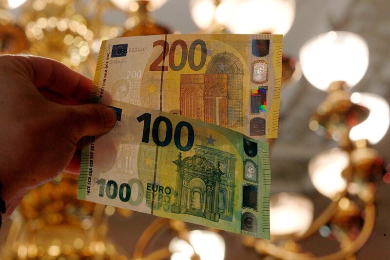 epa07596701 A view of new euro banknotes in Riga, Latvia, 24 May 2019. Latvia will be launching new 100 euro and 200 euro banknotes On 28th May 2019. These are the latest European series of banknotes with refurbished design and advanced security features.  EPA/Toms Kalnins