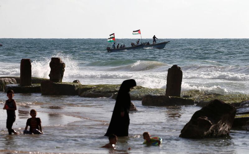Palestinians ride boats during a protest against the Israeli blockade on Gaza, at the sea in Gaza. Reuters