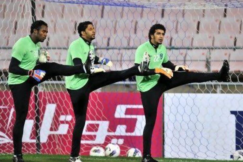 Al Ahli goalkeepers take part in a training session ahead of the Asian Champions League final in Ulsan, some 300 kms south-east of Seoul. Jung Yeon-je / AFP