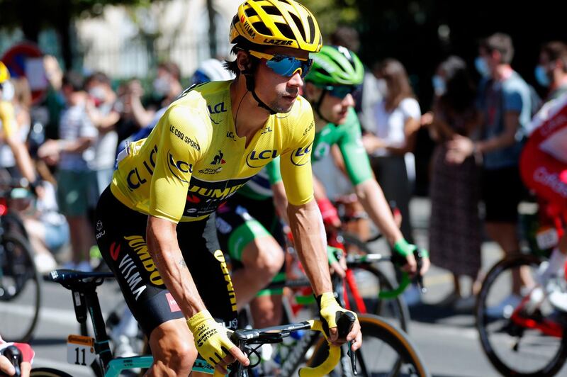 Slovenia's Primoz Roglic remains in the yellow jersey after Stage 14.