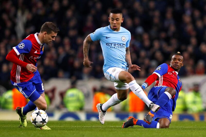 Soccer Football - Champions League Round of 16 Second Leg - Manchester City vs FC Basel - Etihad Stadium, Manchester, Britain - March 7, 2018   Manchester City's Gabriel Jesus in action with Basel���s Serey Die and Fabian Frei    Action Images via Reuters/Jason Cairnduff