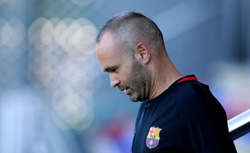 FC Barcelona's Andres Iniesta attends a training session at the Sports Center FC Barcelona Joan Gamper in Sant Joan Despi, Spain, Saturday, Aug. 12, 2017. FC Barcelona will play against Real Madrid in the first leg of Spanish Supercup next Sunday. (AP Photo/Manu Fernandez)