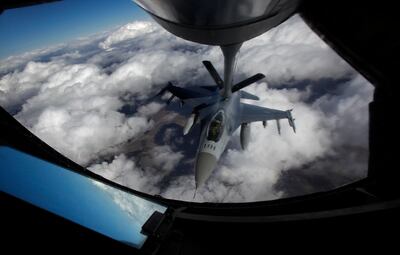 An F-16 refuels in mid-flight during an exercise in the US. AP