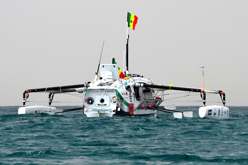 The Row4ocean rowing trimaran leaves Dakar to cross the Atlantic on December 14, 2018. AFP