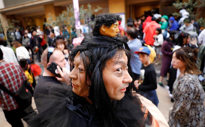 A participant in costume poses for a photo during a Halloween event in Kawasaki. Reuters