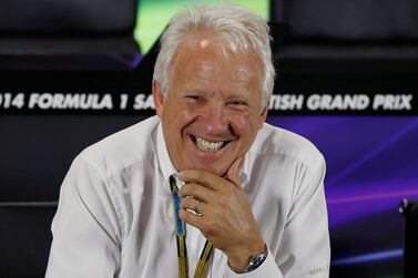 FIA race director Charlie Whiting laughs during a media question and answer session ahead of the British Grand Prixon July 3, 2014. The Briton passed away on Thursday age 66. Reuters