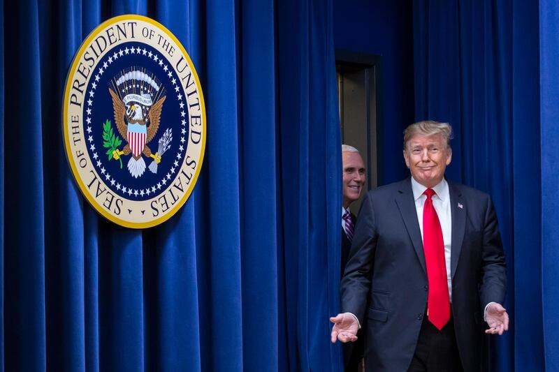 US President Donald Trump, right, and Vice President Mike Pence arrive for a signing ceremony at the White House in Washington, DC, USA. EPA