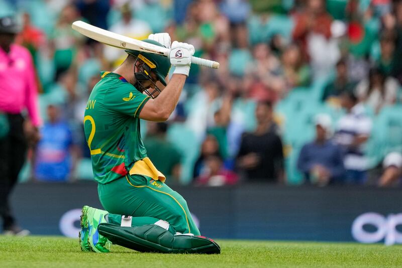 Rilee Rossouw celebrates after scoring a century during the T20 World Cup cricket match between South Africa and Bangladesh. AP