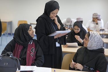 Omani students attend a lecture at the Oman Tourism College. Sebastian Castelier for The National