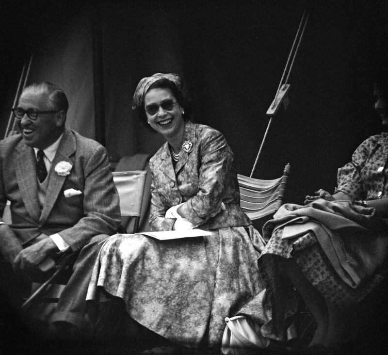 Queen Elizabeth II watching Prince Philip, Duke of Edinburgh during a cricket match at Highclere Castle, Highclere, Hampshire, 3rd August 1958.  (Photo by Victor Blackman/Daily Express/Hulton Archive/Getty Images)