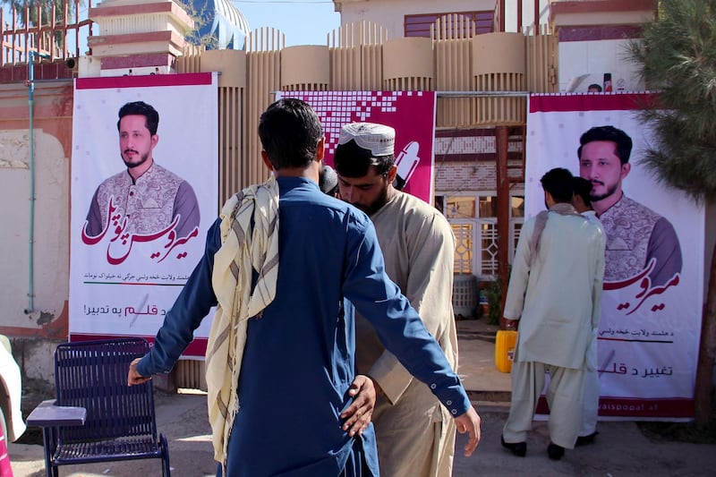 epa07083769 Private security stands guard outside the election campaign office of Miwais Popal, one of the Parliamentary elections candidate as security has been intensified after a parliamentary election candidate was killed in a suicide bomb attack in Helmand, Afghanistan, 10 October 2018. Saleh Muhammad a parliamentary candidate and seven other people were killed on 09 October after a suicide bomber attacked the candidate's campaign office in Lashkar Gah, the capital of the restive Afghan province of Helmand. The Taliban on 08 October appealed to the people of Afghanistan to boycott the upcoming parliamentary elections in the country, calling them an attempt to legitimize the presence of foreign troops in the country. The elections is set for 20 October 2018.  EPA/WATAN YAR