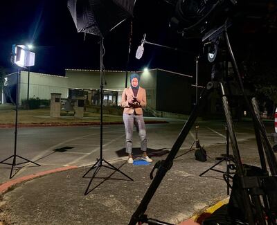 Reporter Tahera Rahman preparing for a live shot in Texas.