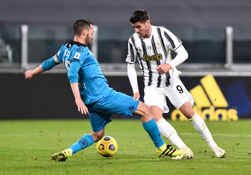 Juventus' Alvaro Morata in action with Spezia's Claudio Terzi. Reuters