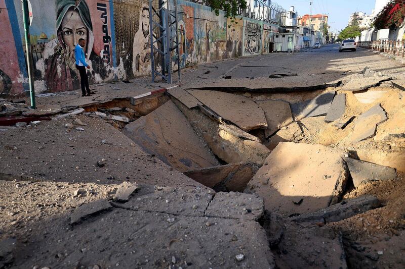 A huge crater in Gaza City caused by the Israeli air strikes. AFP