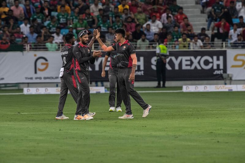 UAE celebrate a wicket against Bangladesh in Dubai.