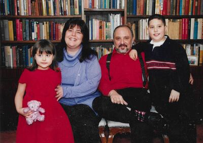 Nabil Najjar, aged seven, with his mother Maysun, father Abed and sister Randa in his grandfather's study in Amman. Photo: Nabil Najjar