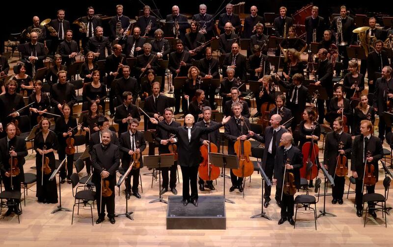Estonian conductor Paavo Järvi, centre, of Orchestre de Paris, says music must communicate something to the listener and also have a degree of emotional accessibility. Photo by Eric Deniset